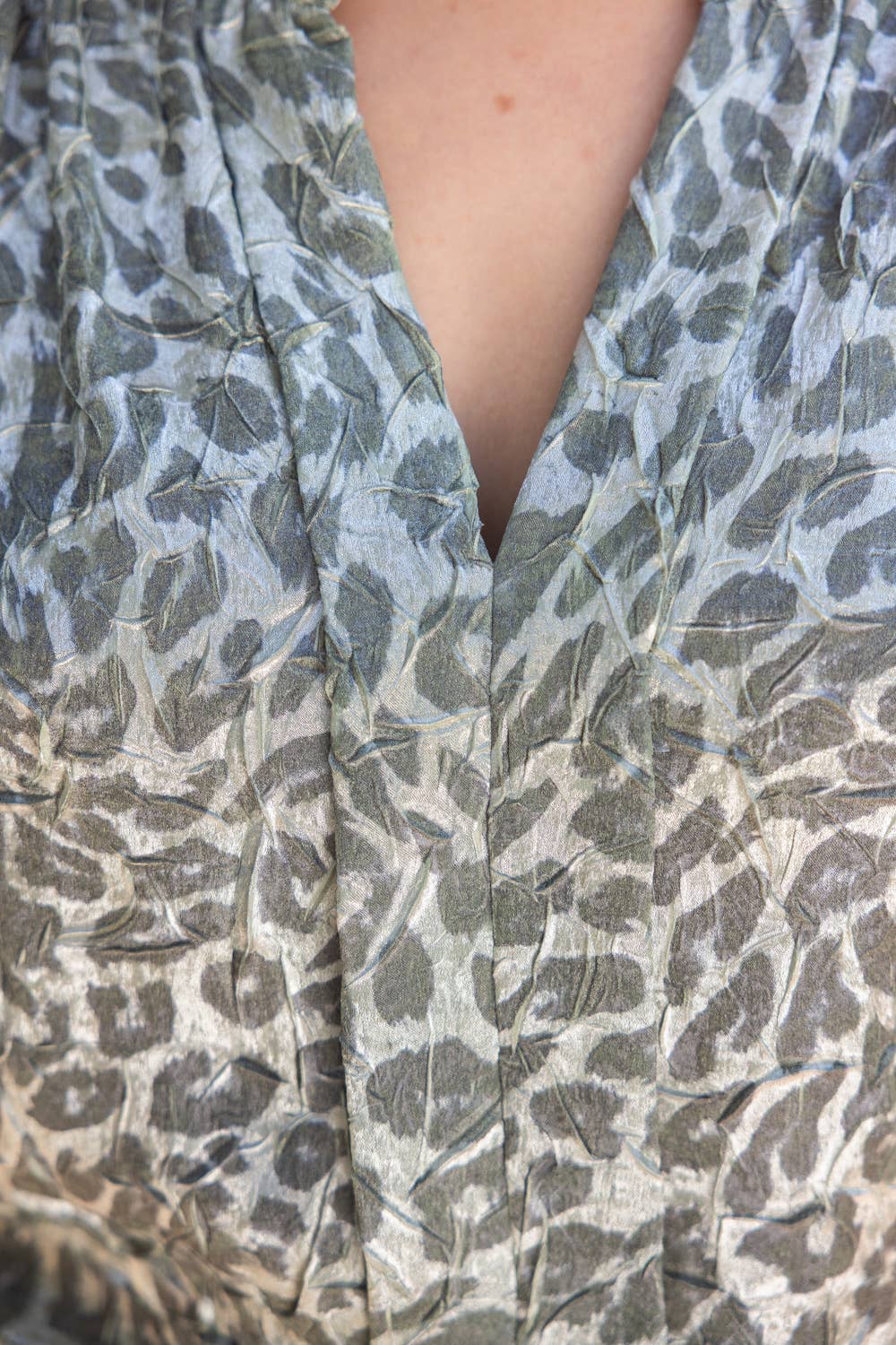 Smocked Short Sleeve V-Neck Animal Print Top