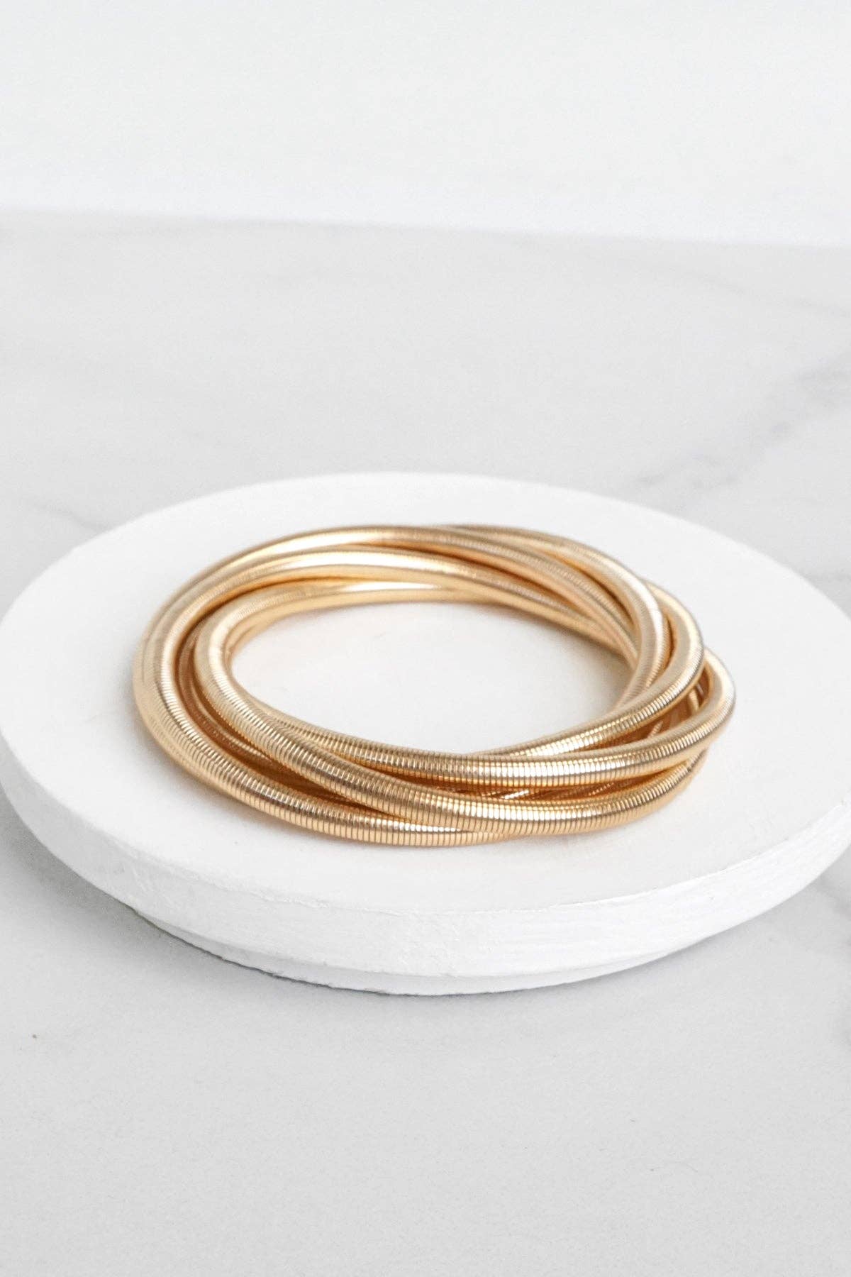 Gold tone multi strand flexy stretchy bracelet bangle