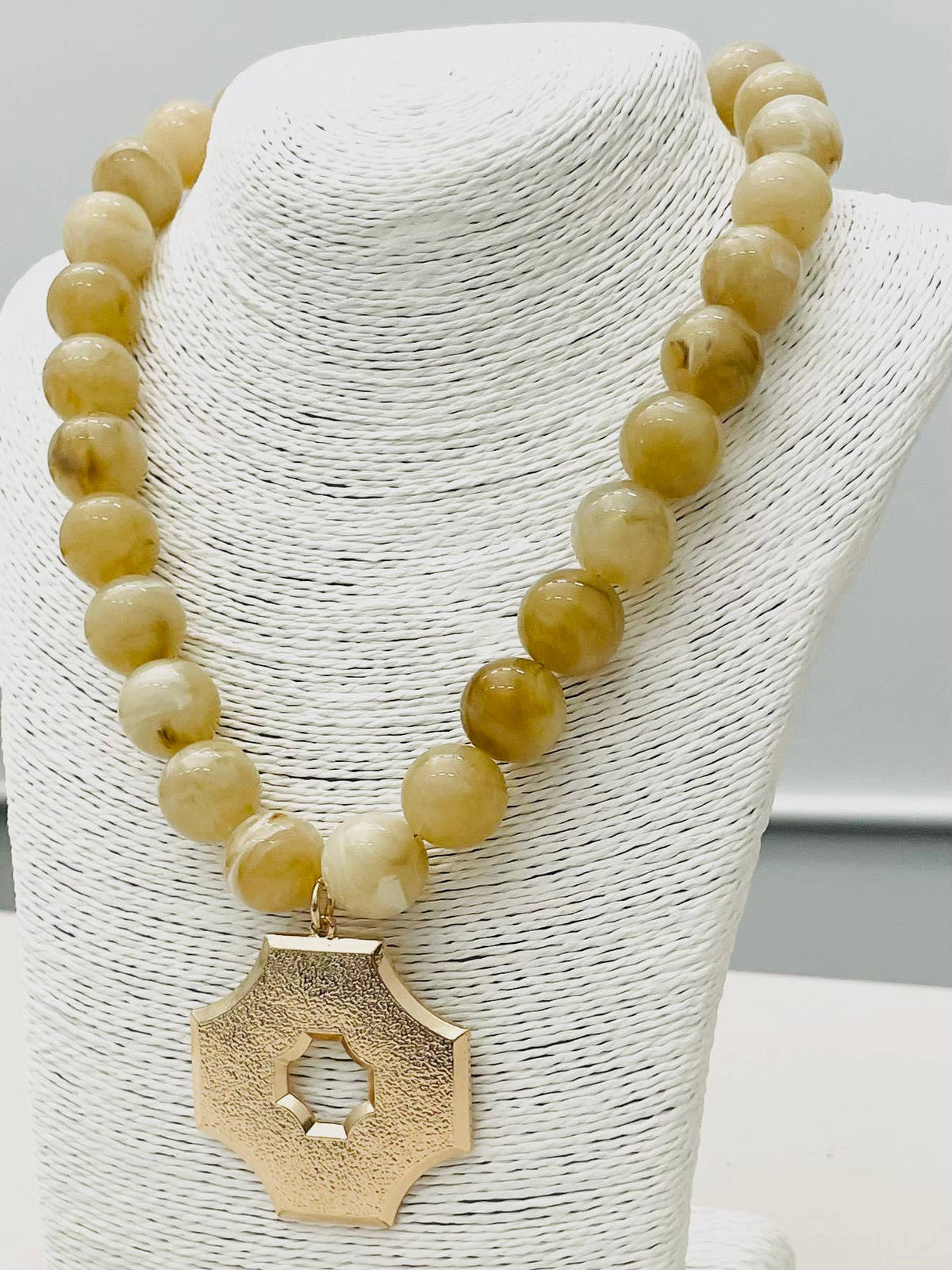 Pendant on Beaded Necklace